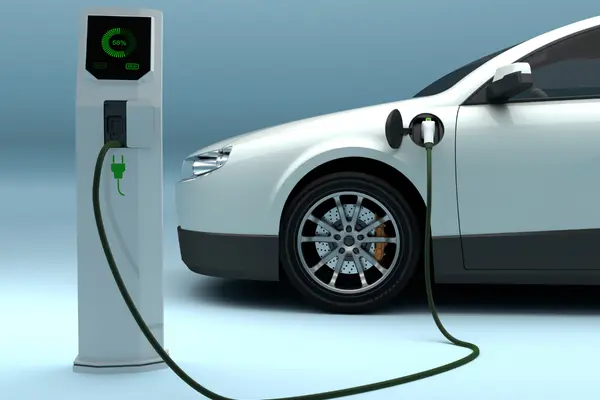 Voiture électrique blanche en charge à une borne affichant 58% de batterie.